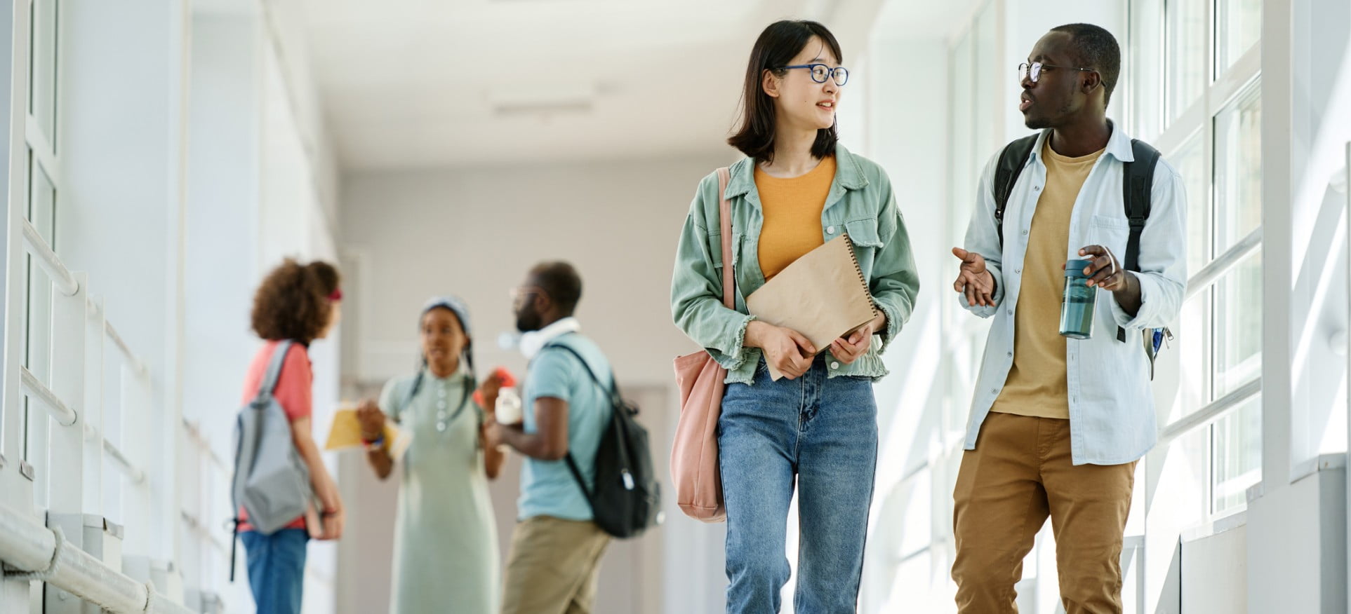 Students talking in the hallway.